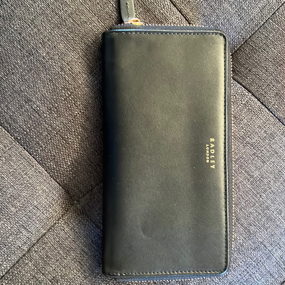 Full-size black Radley wallet.